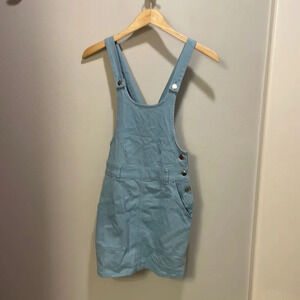 Urban Outfitters woman’s baby blue pinafore